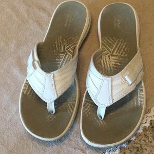 Clark’s flip flops